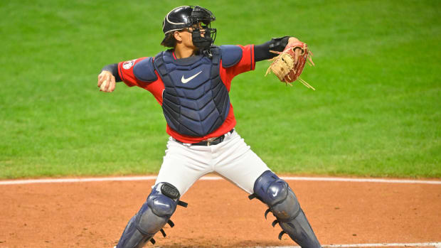 Oct 3, 2022; Cleveland, Ohio, USA; Cleveland Guardians catcher Bo Naylor (44) throws to second base between innings of a game against the Kansas City Royals at Progressive Field. Mandatory Credit: David Richard-USA TODAY Sports